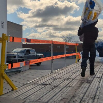 TrukRail protects the flatbed edge so workers can safely load the truck without falling.